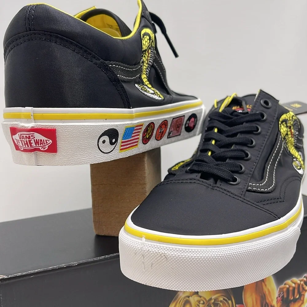 Vans Men’s Old Skool
Cobra Kai Black/Yellow/White 
VN0A3WKT05N
Sneakers - Picture 9 of 16